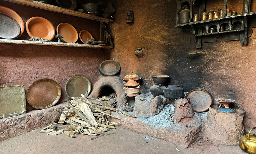 Drive past various adobe Berber villages